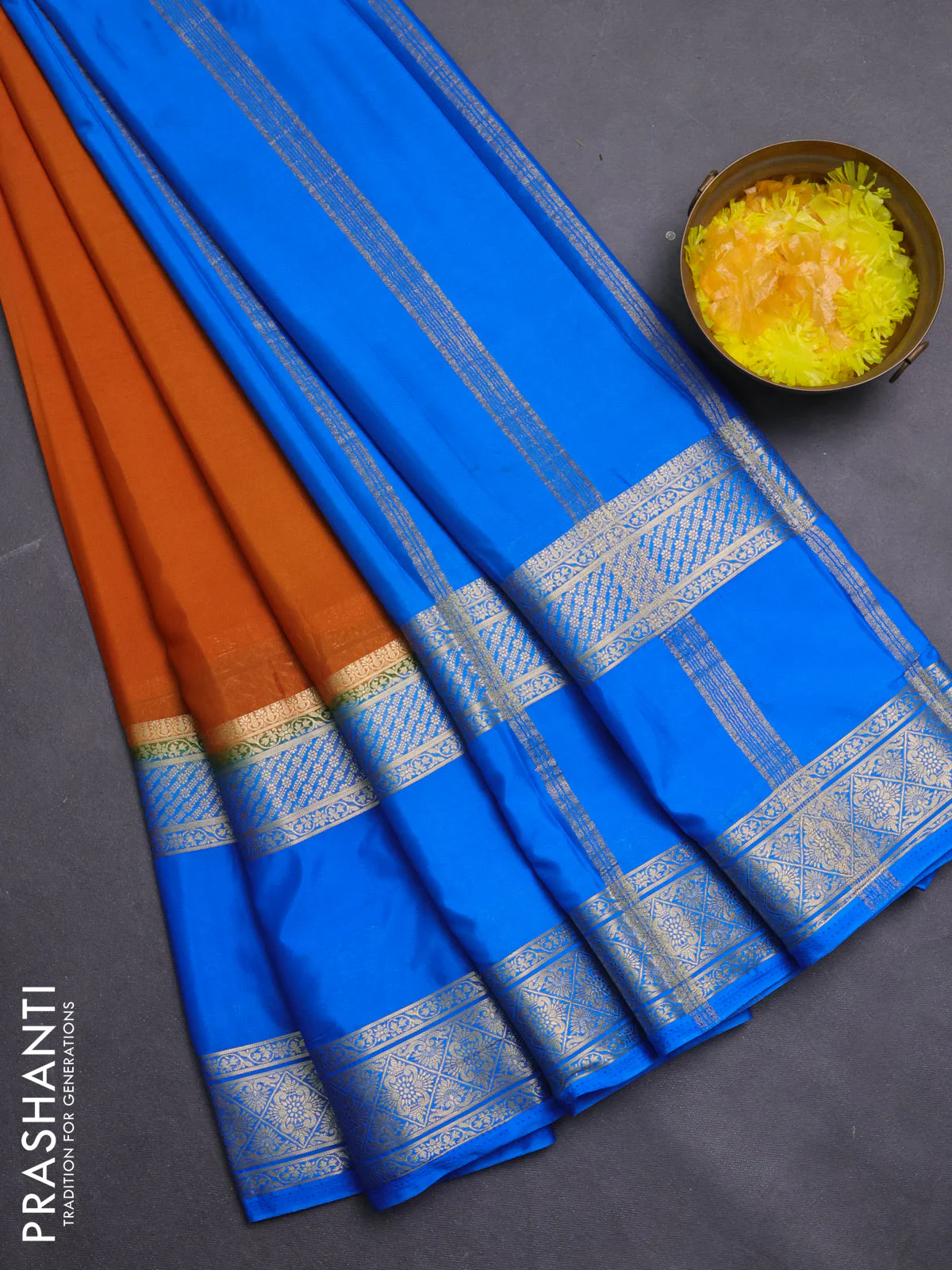 Semi mysore silk saree dark mustard and cs blue with plain body and rettapet zari woven border