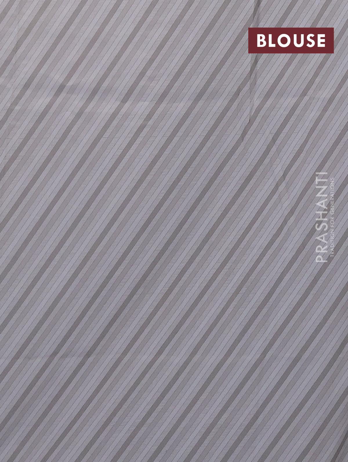 Semi orangza saree grey  and  with allover embroidery work & floral prints and crocia lace border - Image 4