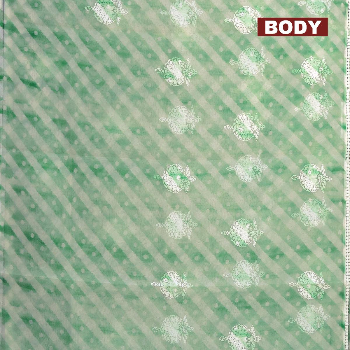 Semi orangza saree off white and green with allover ikat prints & embroidery buttas and crocia lace border - Image 2
