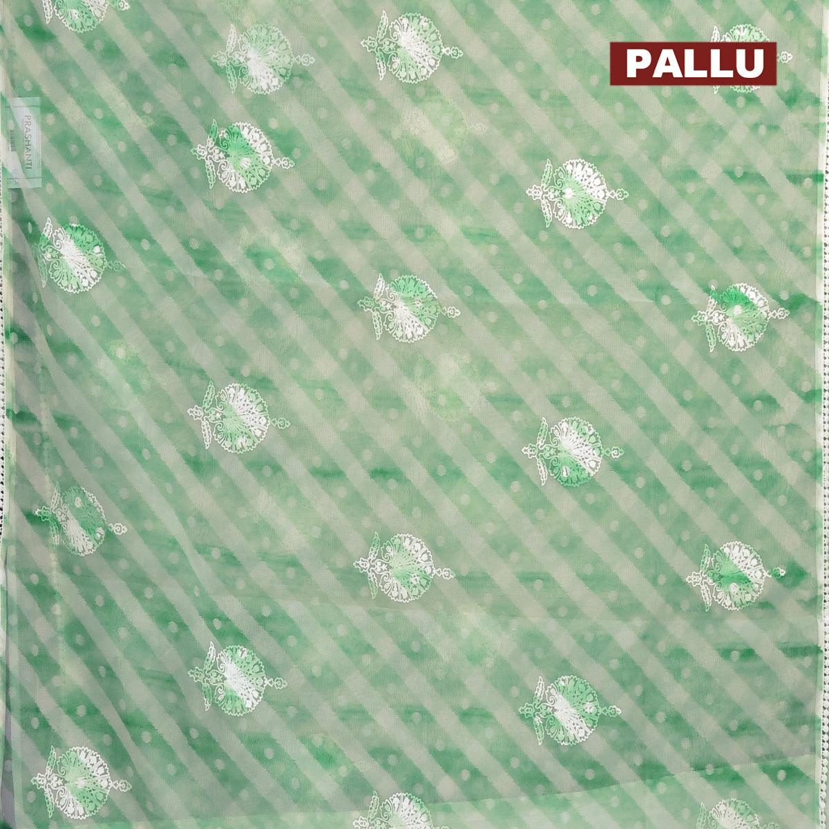 Semi orangza saree off white and green with allover ikat prints & embroidery buttas and crocia lace border - Image 3