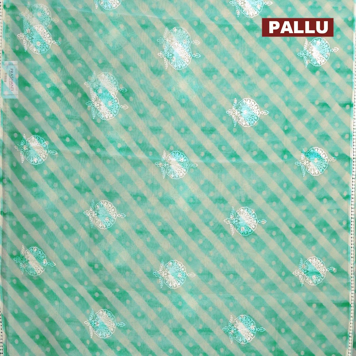 Semi orangza saree off white and teal blue with allover ikat prints & embroidery buttas and crocia lace border - Image 3