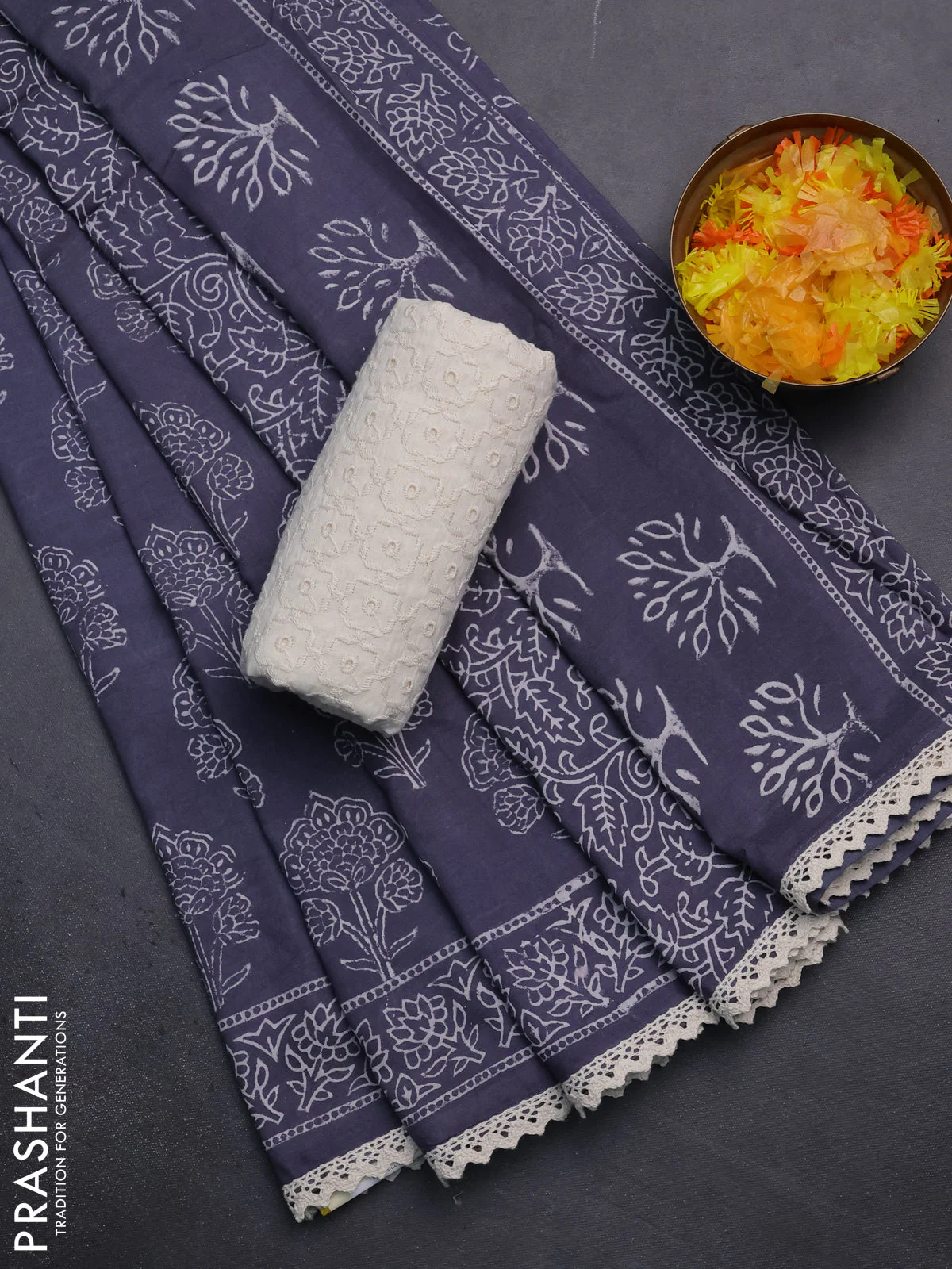 Semi pashmina silk saree grey and cream with allover floral butta prints and crocia lace work border