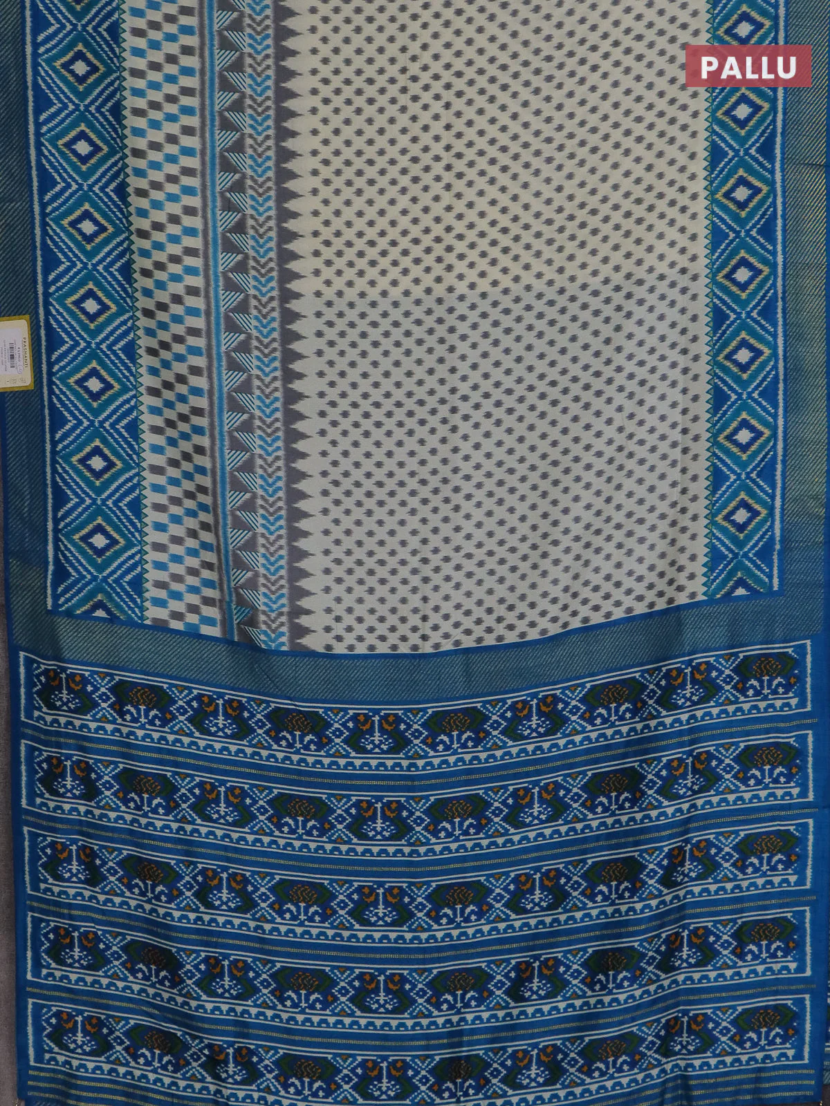 Semi patola saree off white and cs blue with allover ikat weaves and zari woven border - Image 3