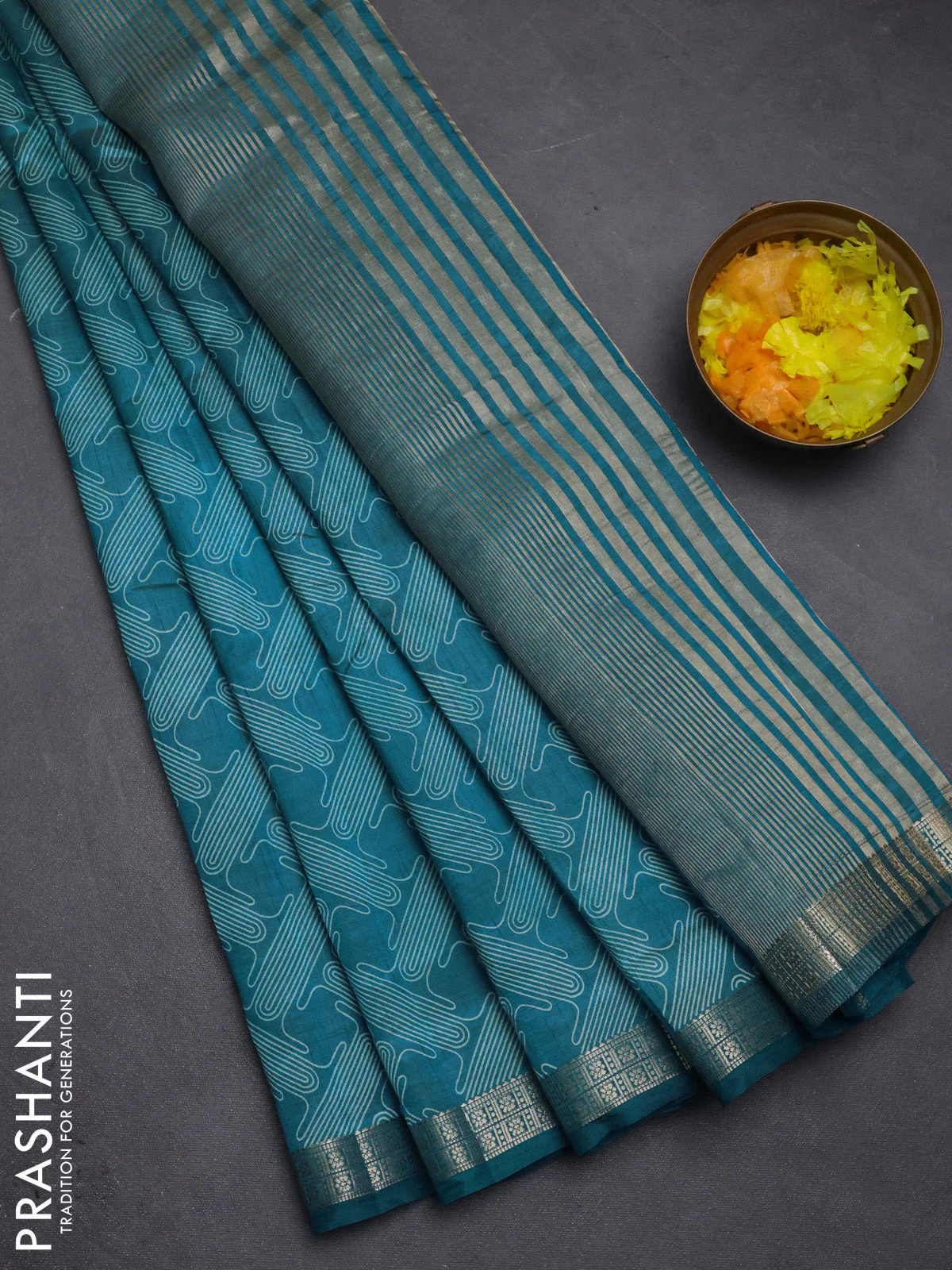 Semi raw silk saree cs blue with allover geometric prints and zari woven border