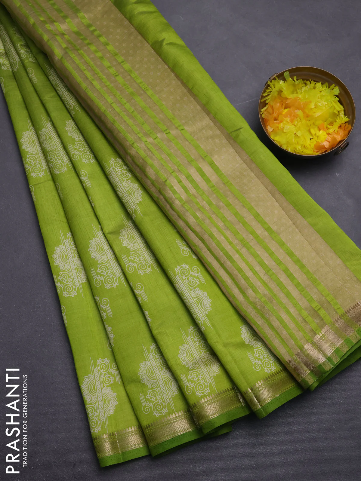 Semi raw silk saree fluorescent green with butta prints and zari woven border