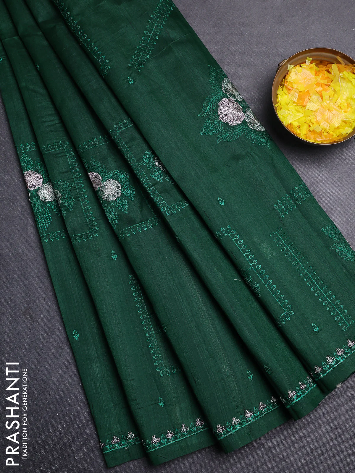 Semi raw silk saree green with allover embroidery buttas and embroidery border