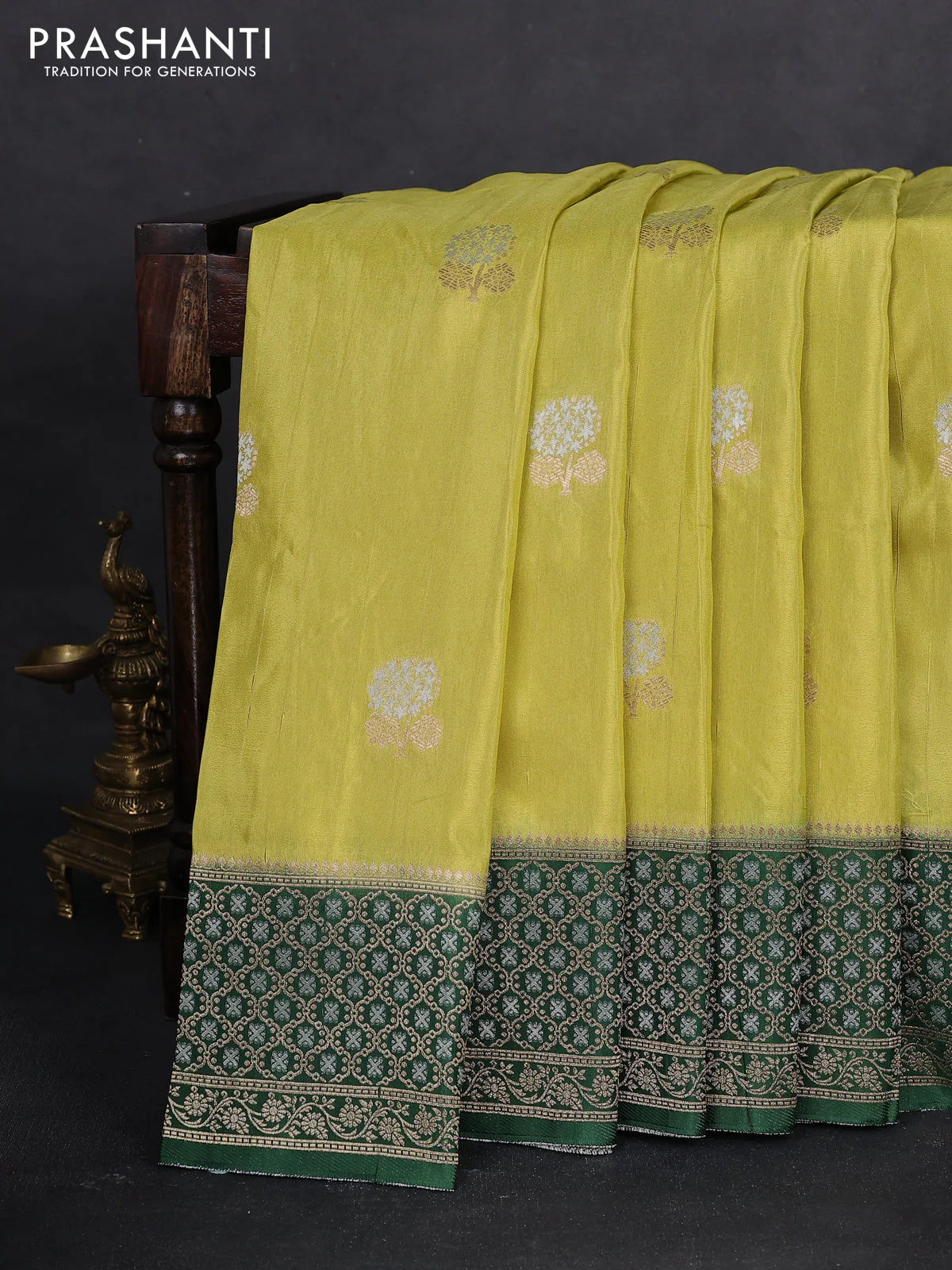 Semi raw silk saree Lime green and bottle green with silver & gold zari woven buttas and zari woven border