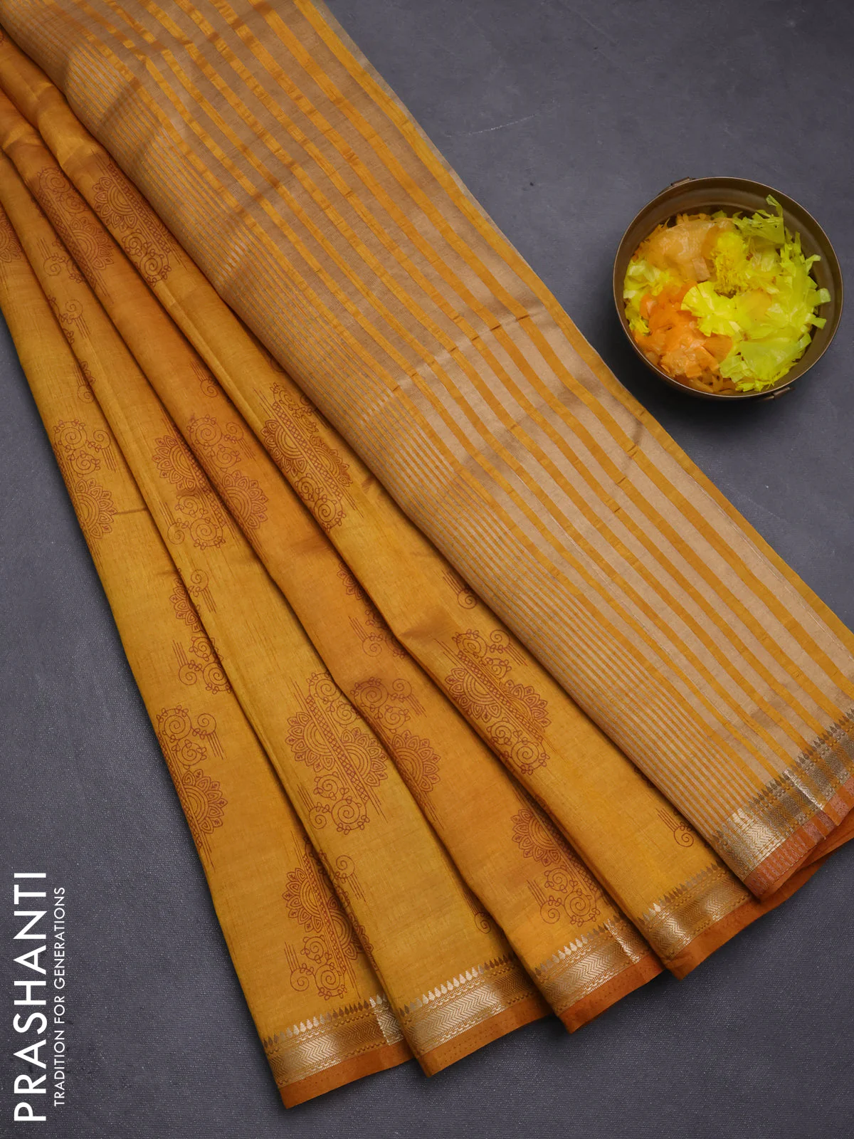 Semi raw silk saree mustard yellow with butta prints and zari woven border