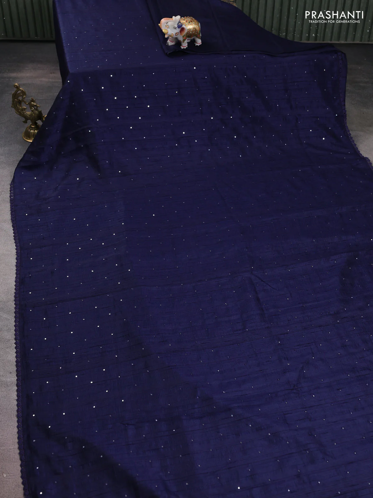 Semi raw silk saree navy blue with allover mirror work and lace work border - Image 2