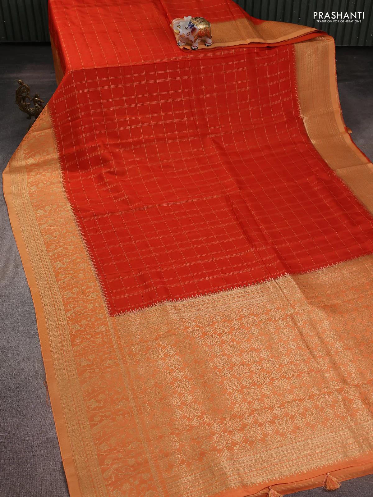 Semi raw silk saree orange and pale orange with allover zari woven checked pattern and zari woven border - Image 2