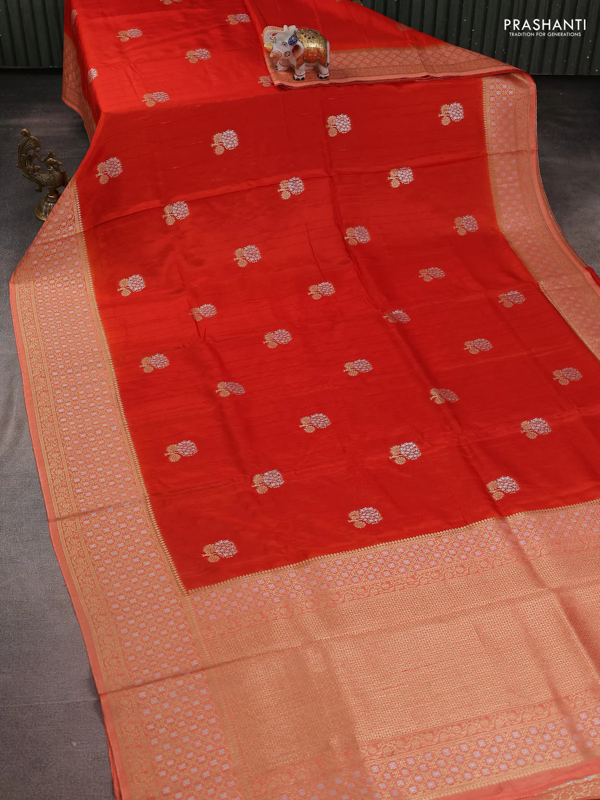 Semi raw silk saree orange and peach orange with silver & gold zari woven buttas and zari woven border - Image 2