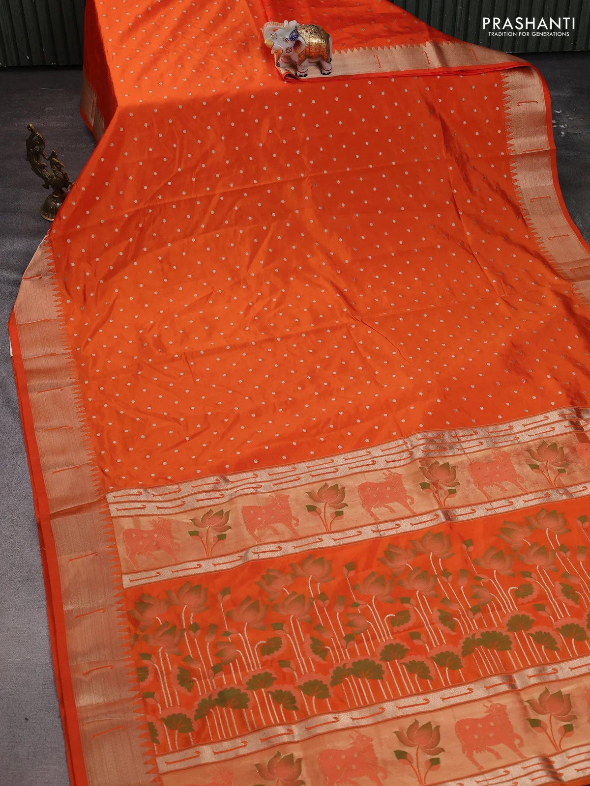 Semi raw silk saree orange with allover zari woven buttas and pichwai design pallu - Image 2