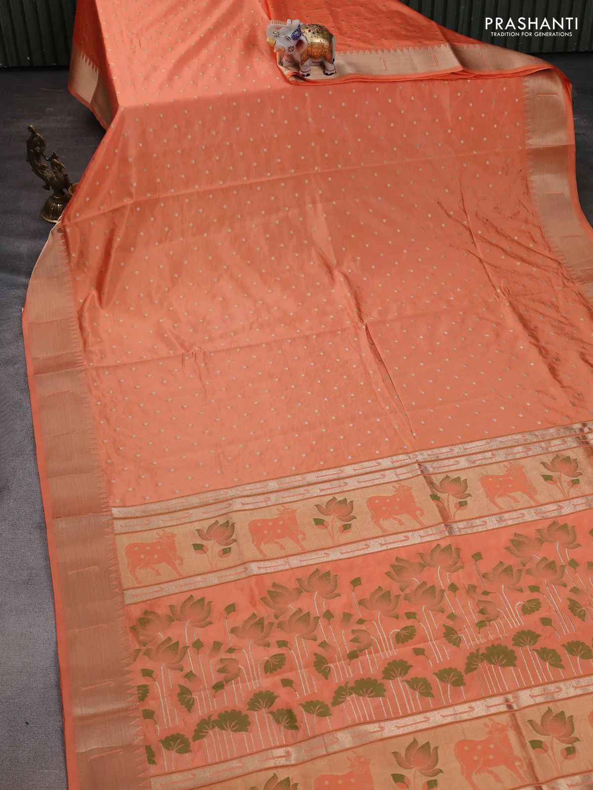Semi raw silk saree orange with allover zari woven buttas and pichwai design pallu - Image 2