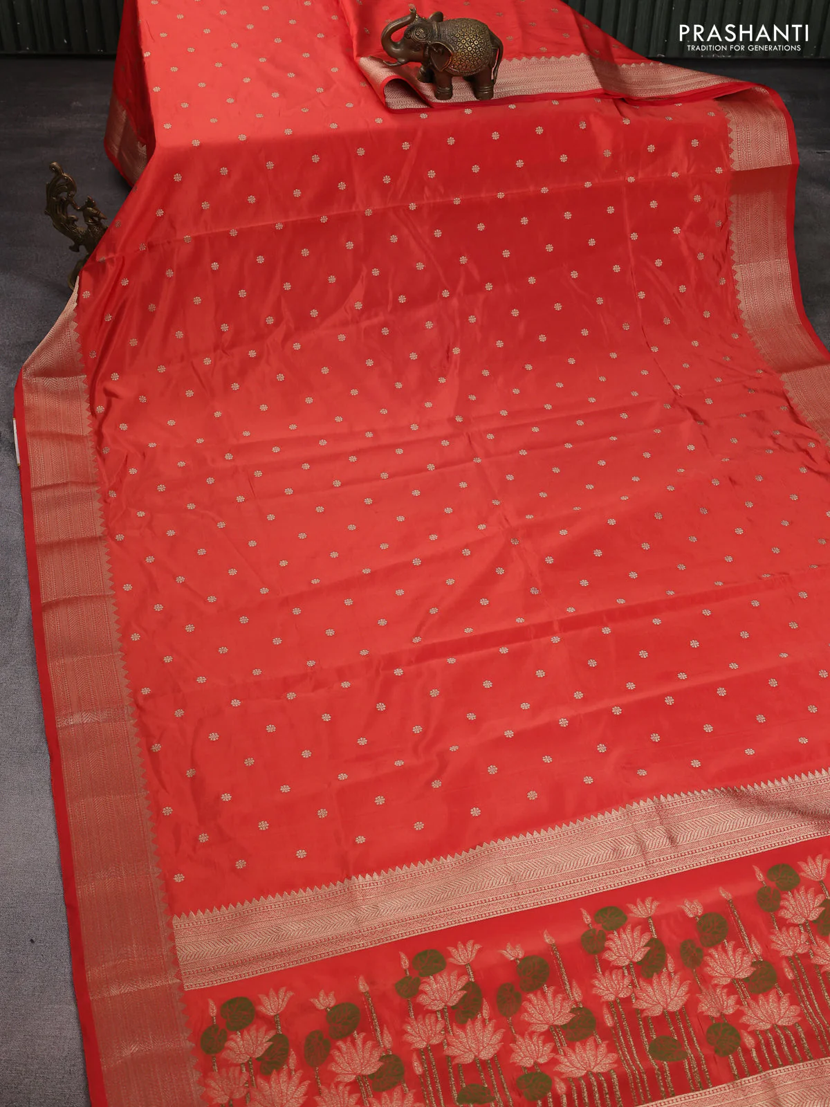 Semi raw silk saree orange with allover zari woven buttas and zari woven border - Image 2