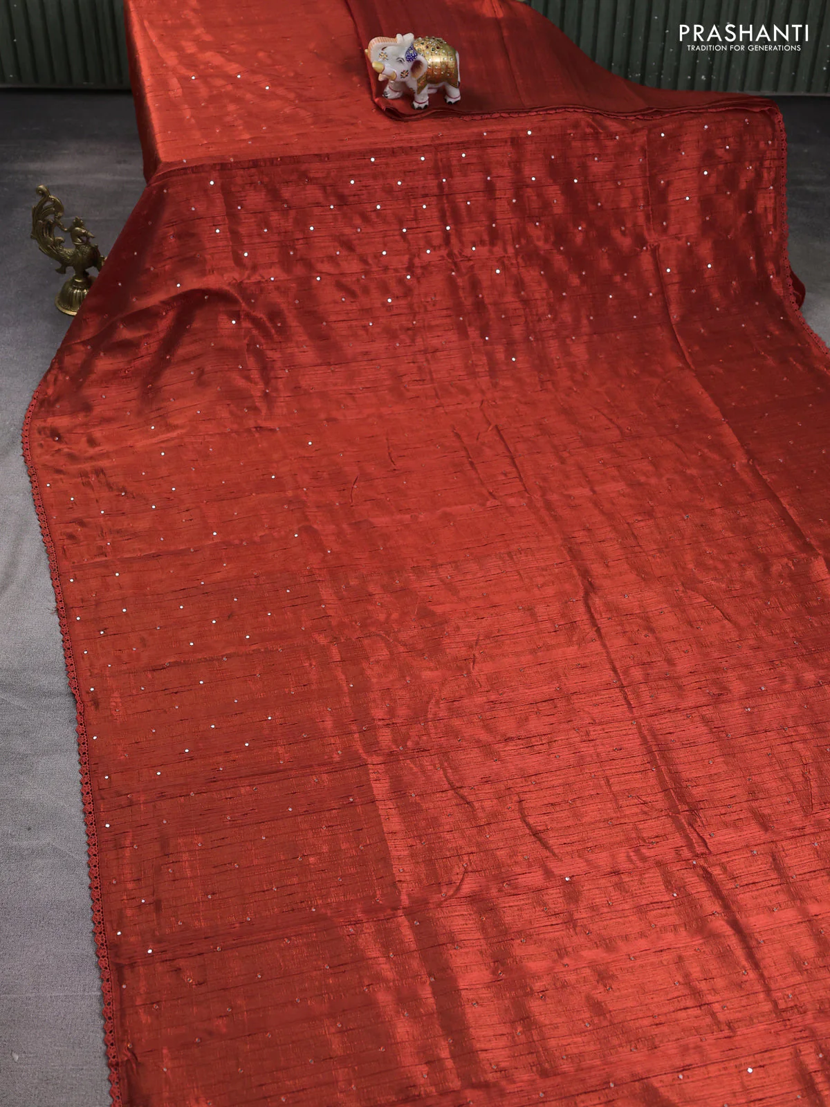 Semi raw silk saree rust shade with allover mirror work and lace work border - Image 2