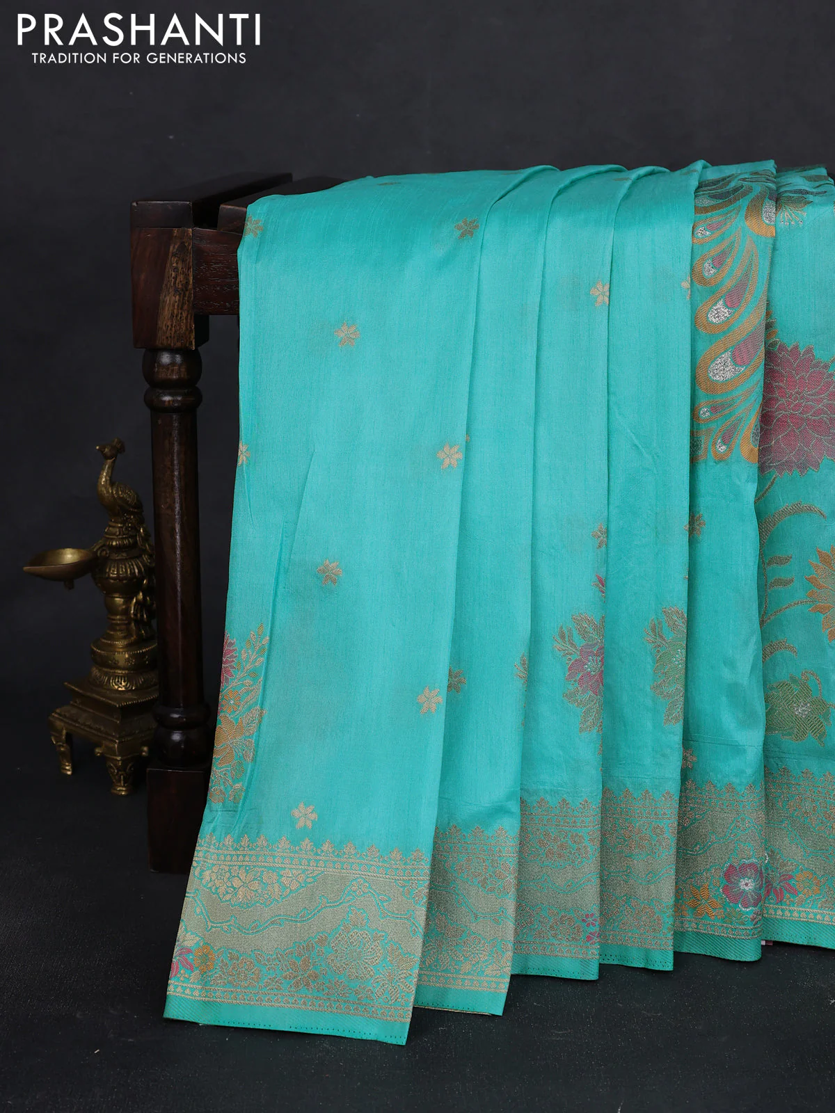 Semi raw silk saree teal blue and allover jamdhani weaves and zari woven border - Image 2