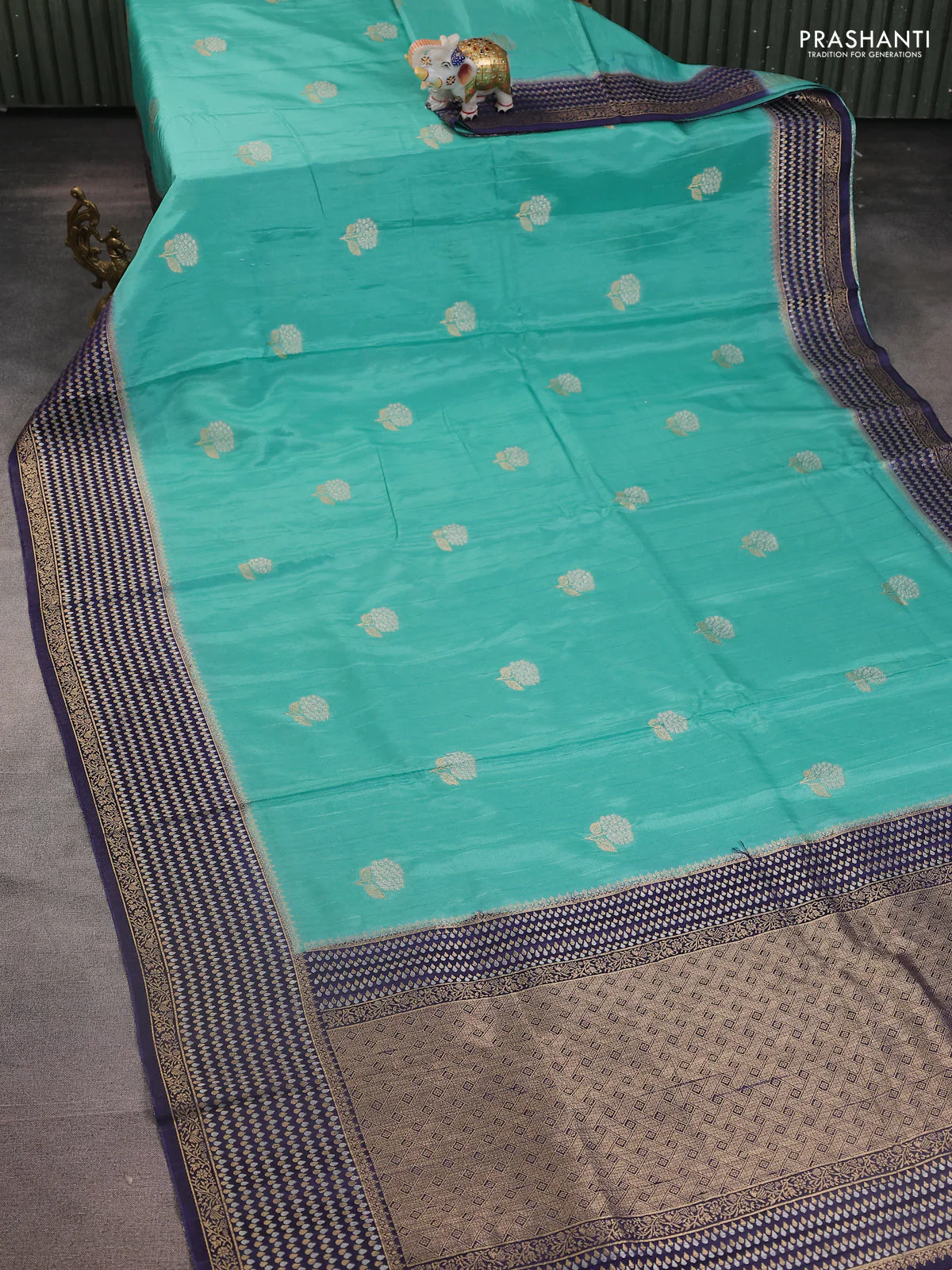 Semi raw silk saree teal blue and navy blue with silver & gold flower zari woven buttas and zari woven border - Image 2