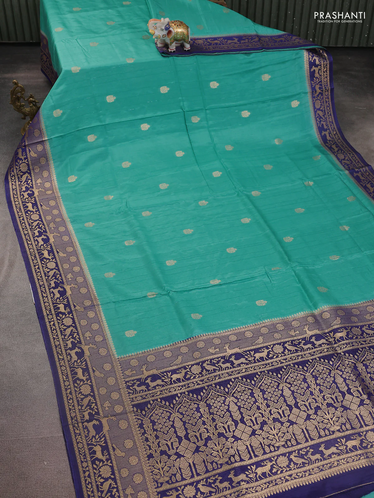 Semi raw silk saree teal blue and navy blue with zari woven buttas and zari woven border - Image 2