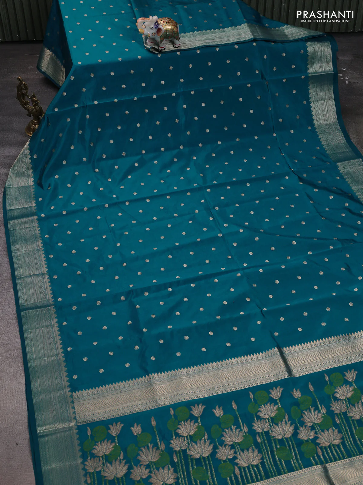 Semi raw silk saree teal blue with allover zari woven buttas and zari woven border - Image 2