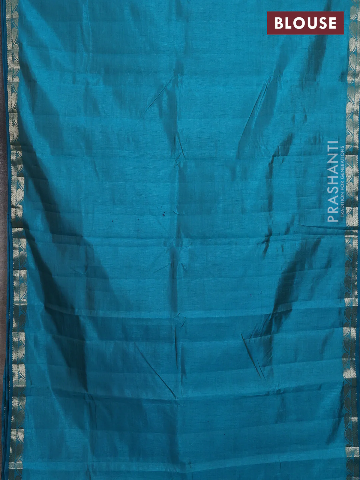 Semi raw silk saree teal blue with plain body and zari woven border - Image 2