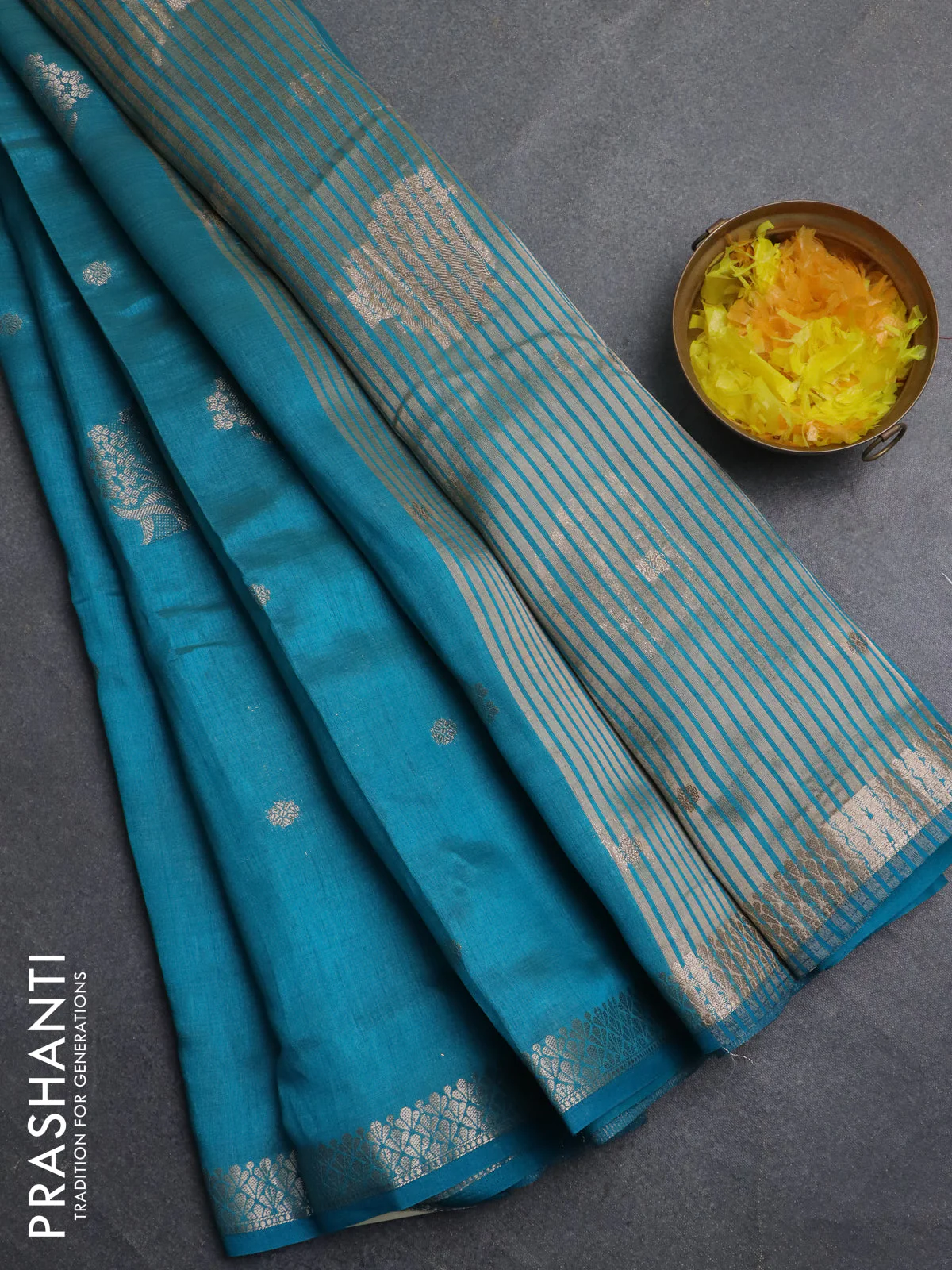 Semi raw silk saree teal blue with zari woven buttas and zari woven border