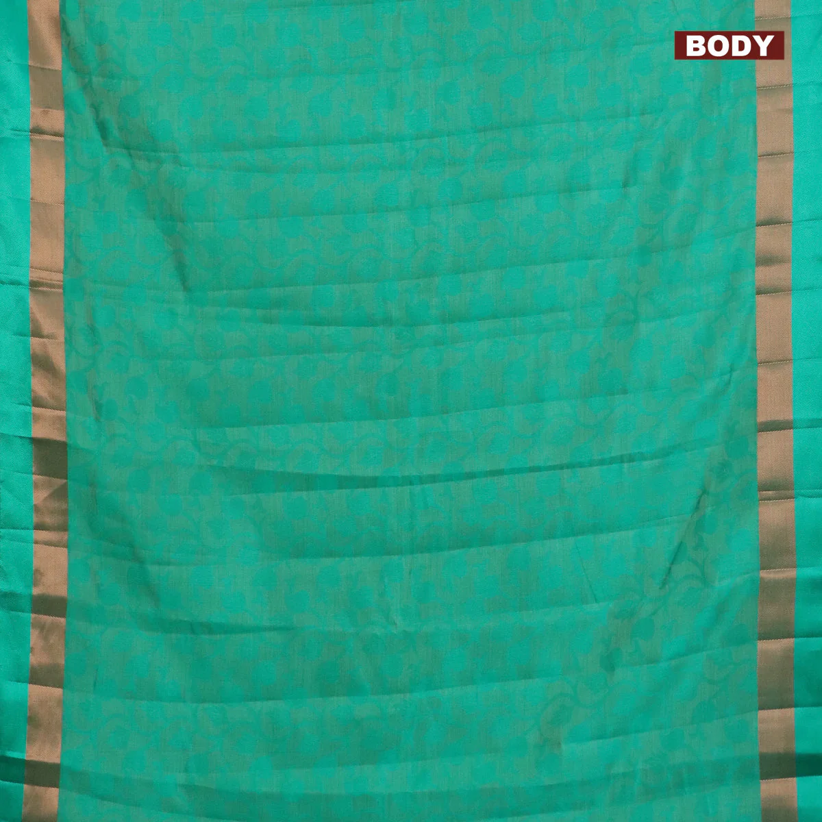 Semi raw silk saree teal green with allover self emboss and zari woven border - Image 2