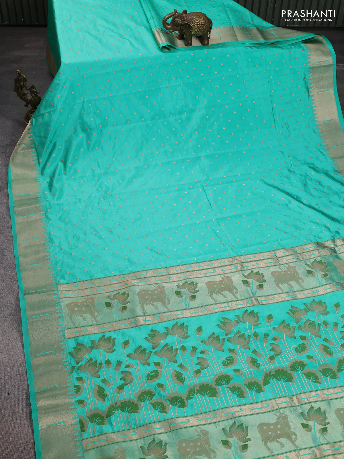 Semi raw silk saree teal green with allover zari woven buttas and pichwai design pallu - Image 2