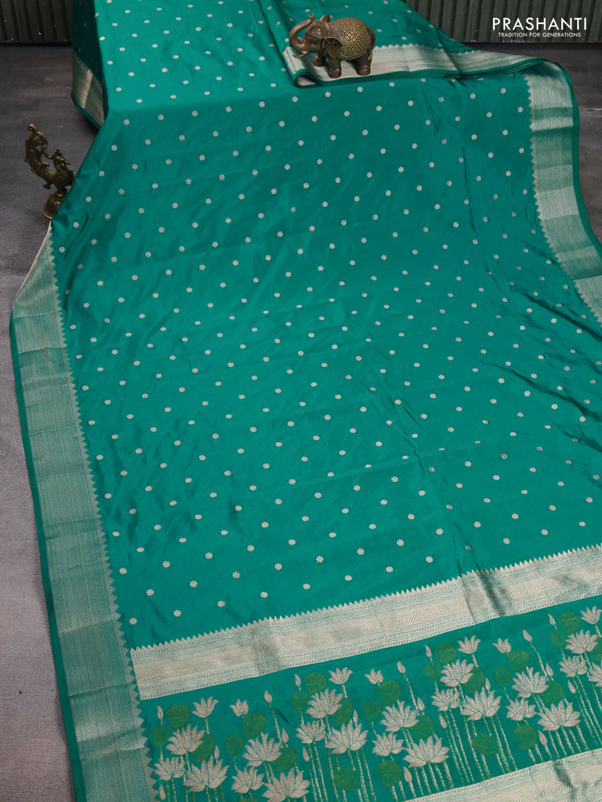 Semi raw silk saree teal green with allover zari woven buttas and zari woven border - Image 2