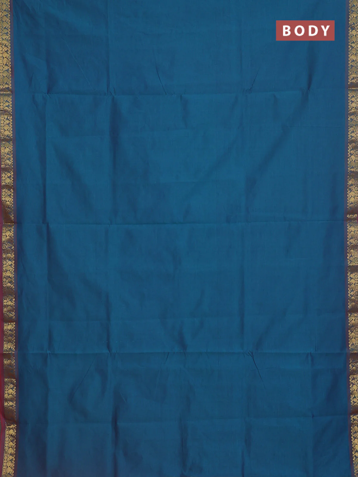 Semi silk cotton saree dual shade of peacock blue and red with plain body and zari woven border - Image 2
