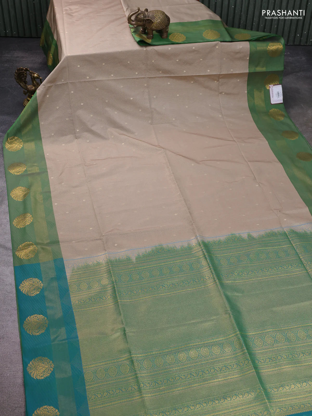Semi soft silk saree beige and green with allover zari weaves & buttas and zari woven border - Image 2