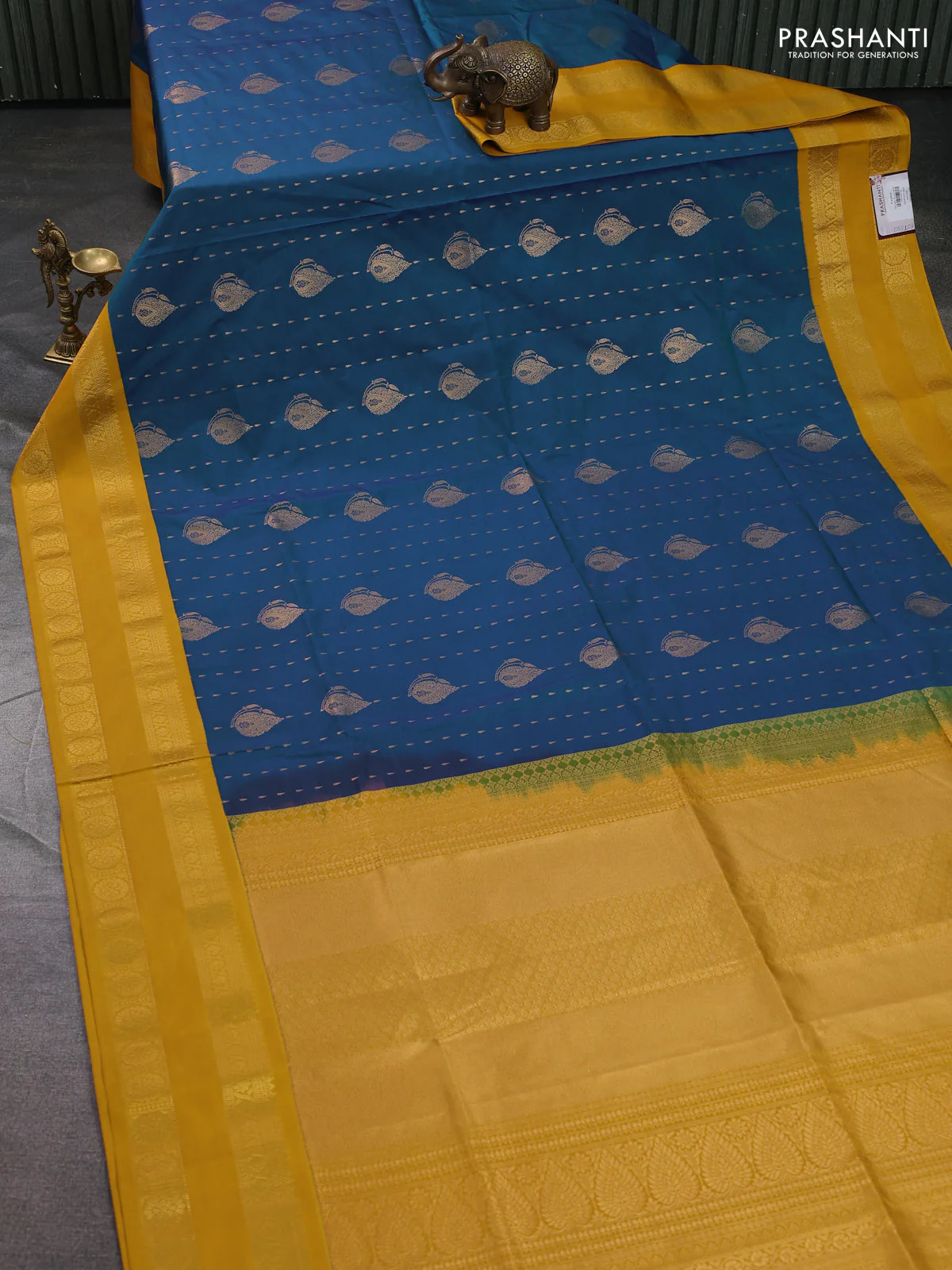 Semi soft silk saree blue and mustard yellow with allover zari woven buttas and zari woven korvai border - Image 2
