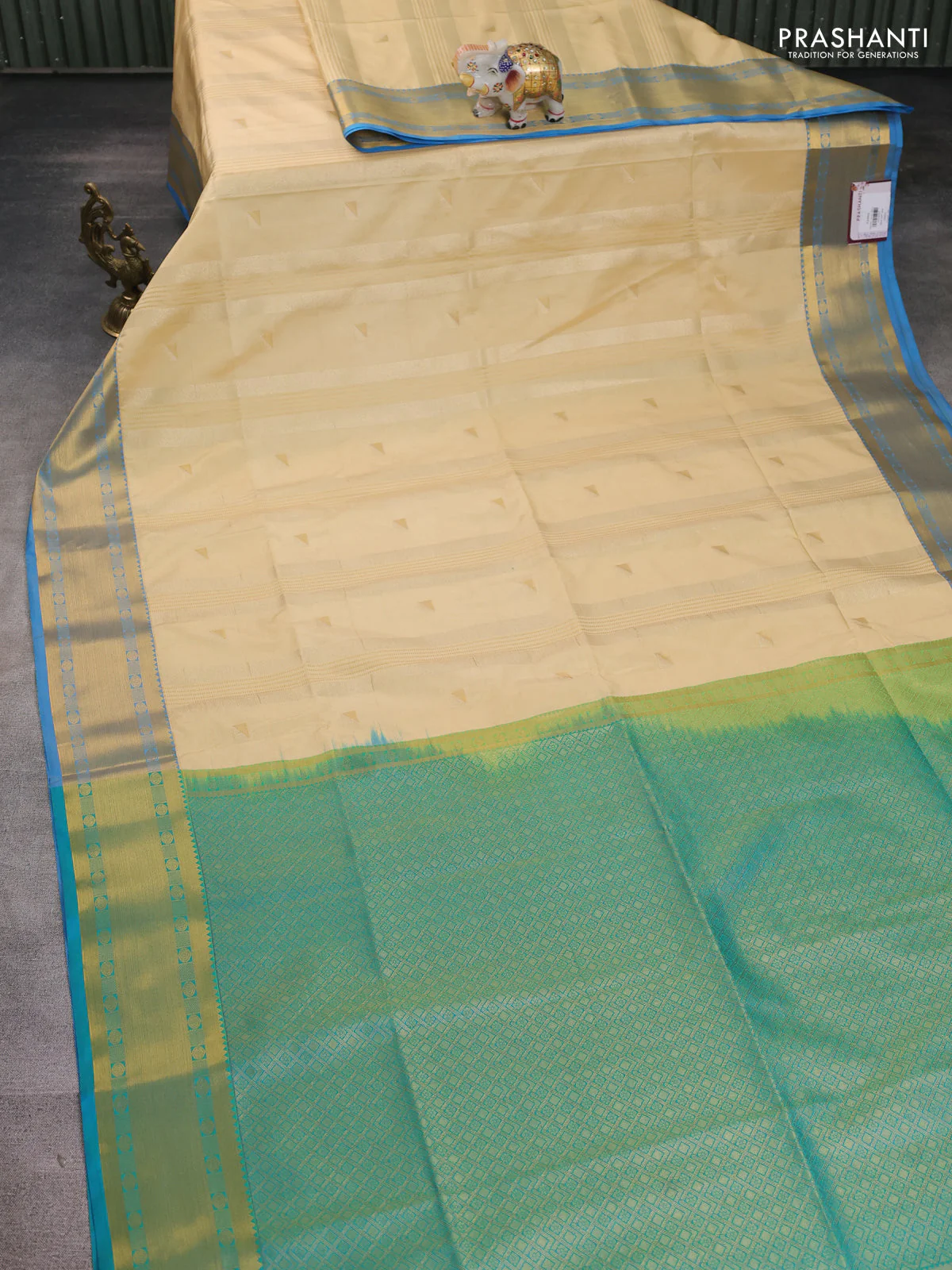 Semi soft silk saree cream and cs blue with zari weaves & buttas and zari woven border - Image 2