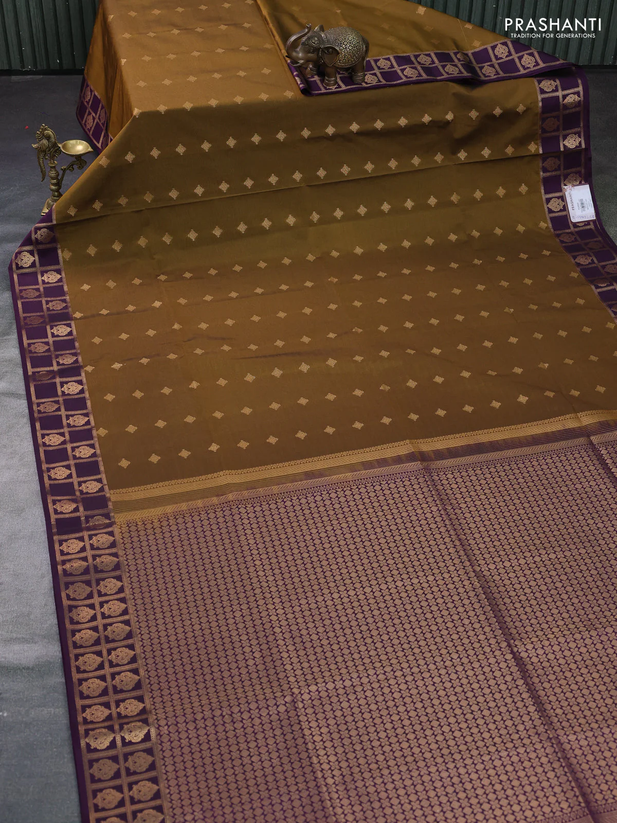 Semi soft silk saree dark mehendi green and purple with allover zari woven buttas and zari woven border - Image 2