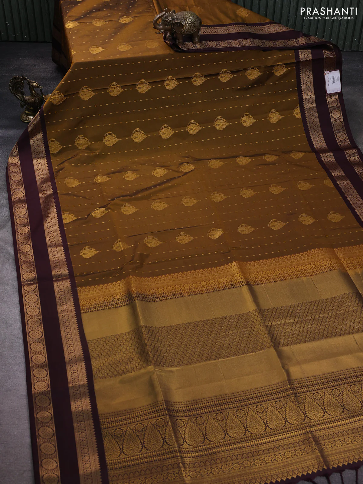 Semi soft silk saree dark mustard and coffee brown with allover zari woven buttas and zari woven korvai border - Image 2
