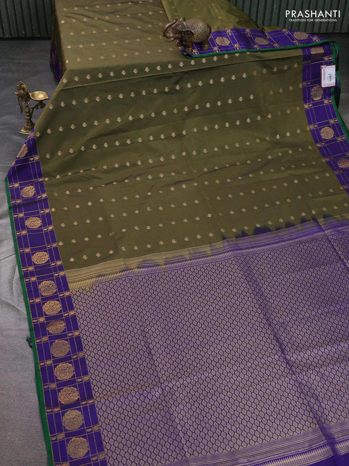 Semi soft silk saree dark sap green and blue with allover zari woven buttas and zari woven korvai border - Image 2