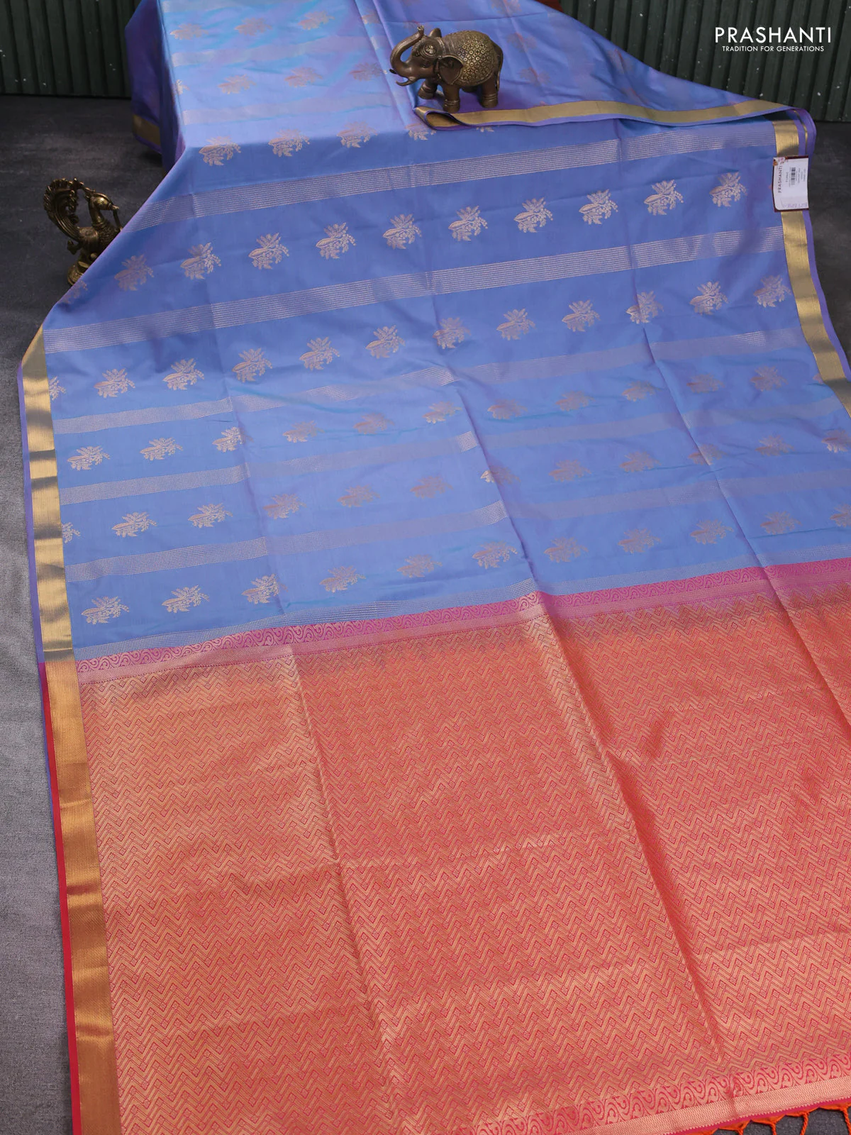 Semi soft silk saree dual shade of lavender and pinkish orange with allover zari weaves & buttas and small zari woven border - Image 2