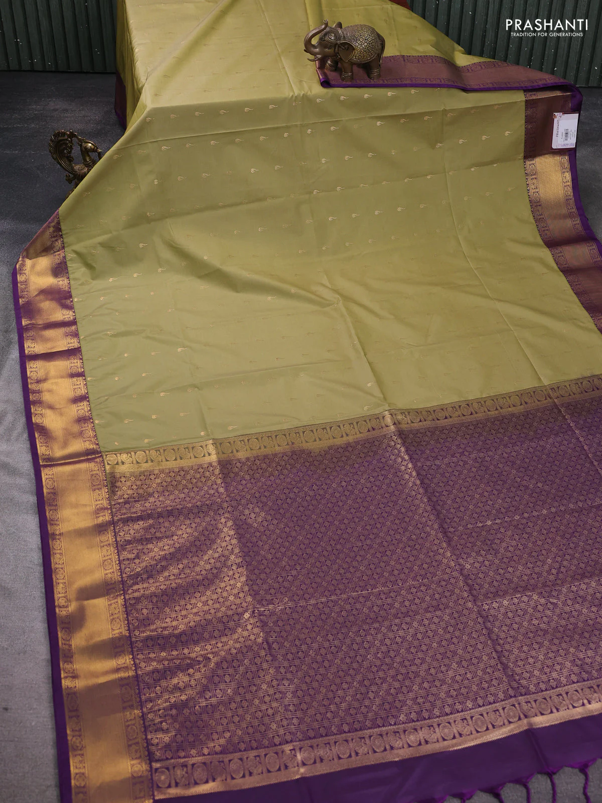 Semi soft silk saree elaichi green and purple with allover zari woven buttas and zari woven border - Image 2