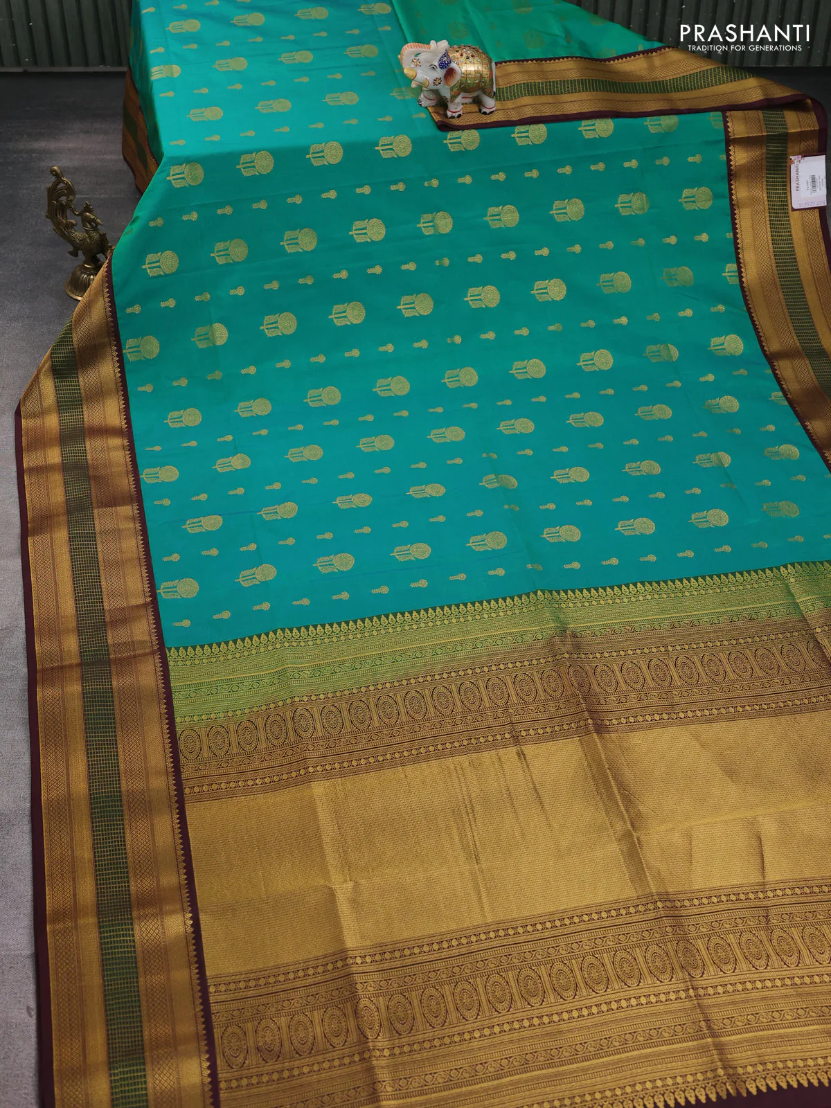 Semi soft silk saree green and coffee brown with allover zari woven buttas and zari woven border - Image 2