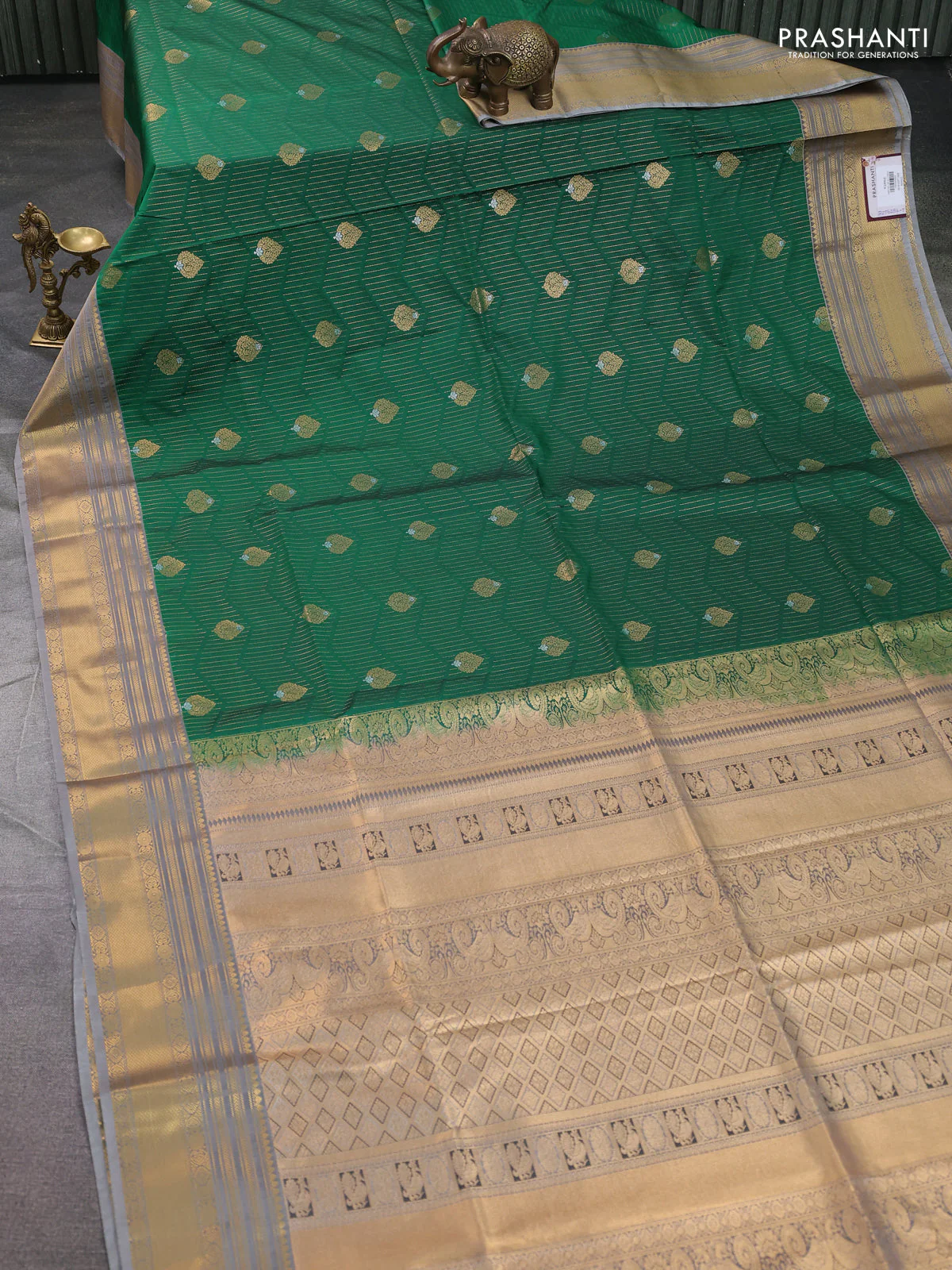 Semi soft silk saree green and grey with allover zari weaves & buttas and zari woven border - Image 2