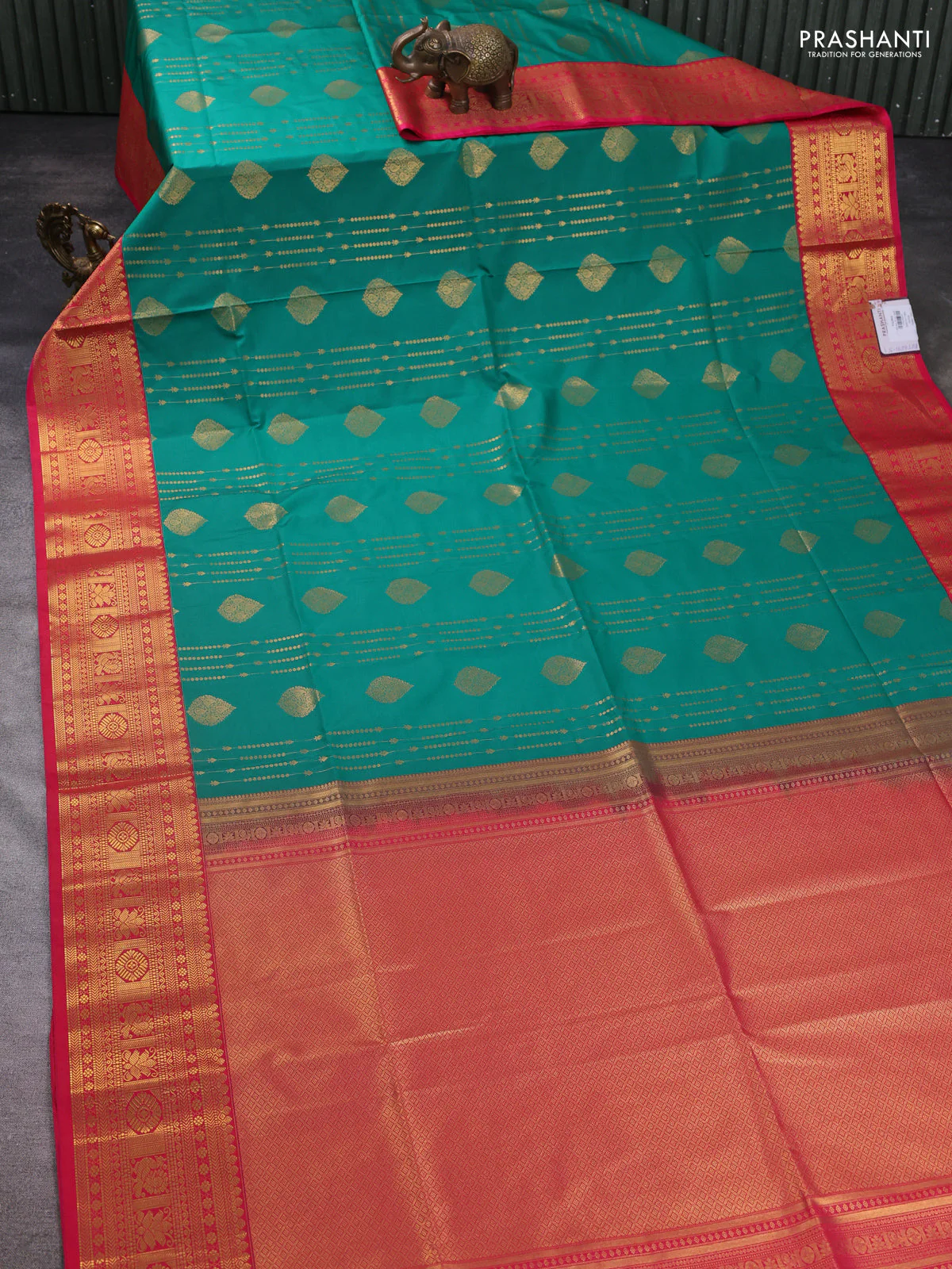 Semi soft silk saree green and pink with allover zari weaves & buttas and zari woven border - Image 2