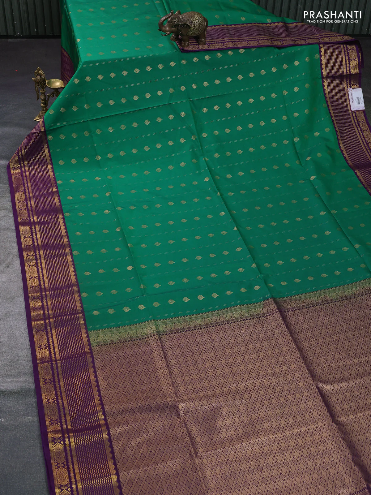 Semi soft silk saree green and purple with allover zari woven buttas and zari woven border - Image 2