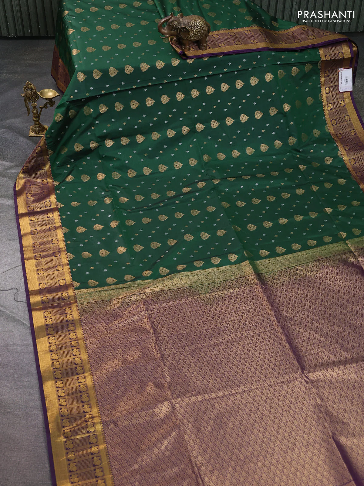 Semi soft silk saree green and violet with allover zari woven buttas and zari woven border - Image 2