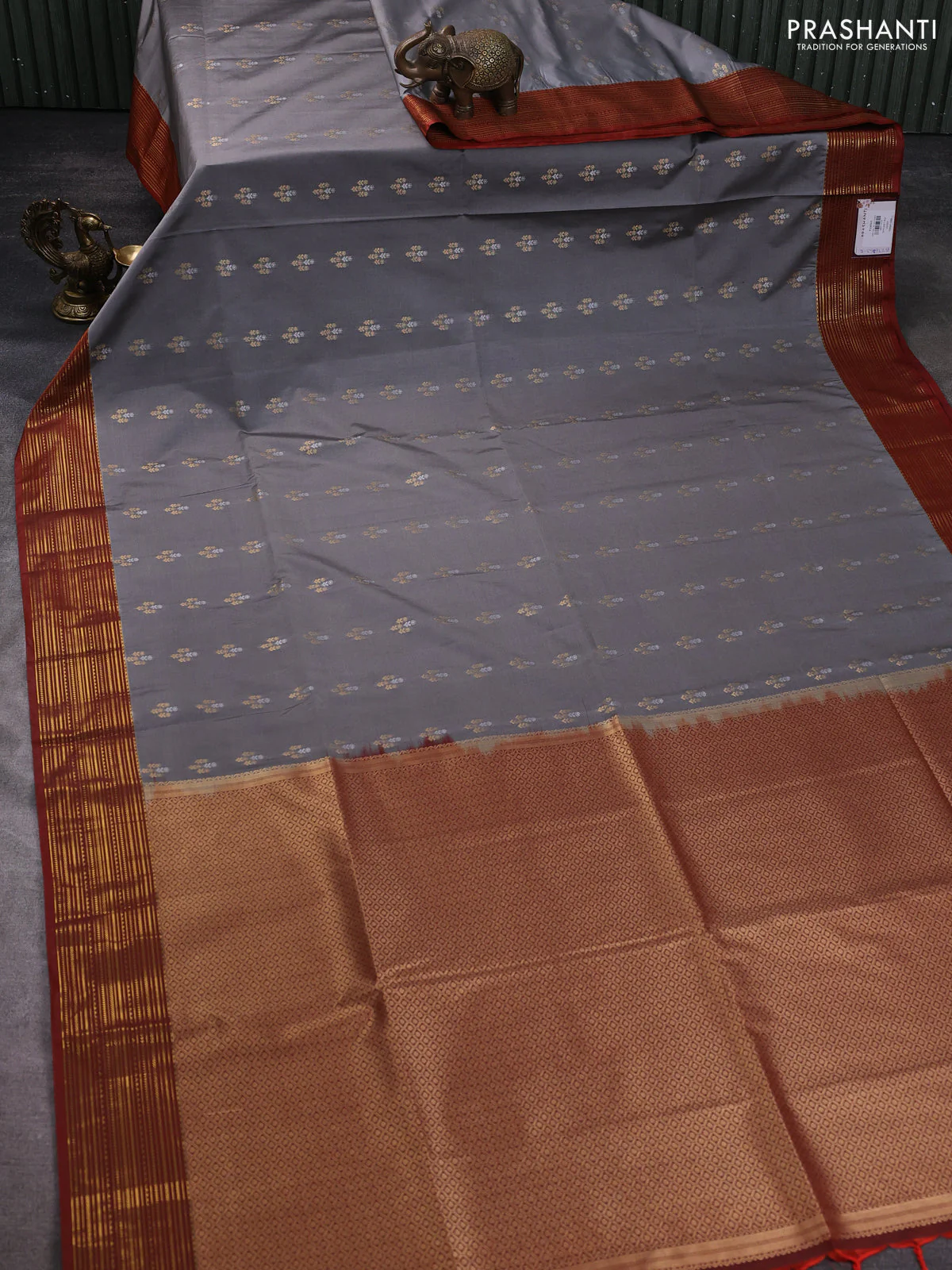 Semi soft silk saree grey and rust shade with allover zari woven buttas and zari woven korvai border - Image 2