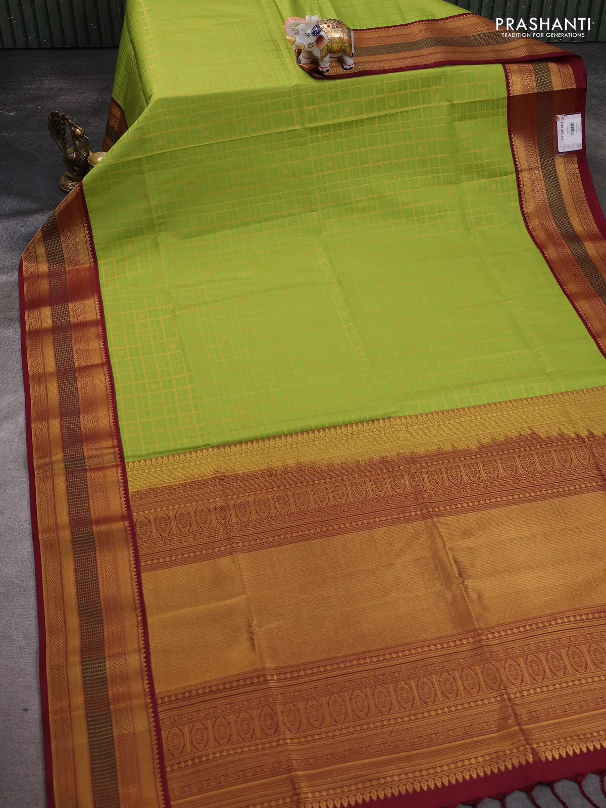 Semi soft silk saree light green and deep maroon with allover zari checks & buttas and zari woven border - Image 2