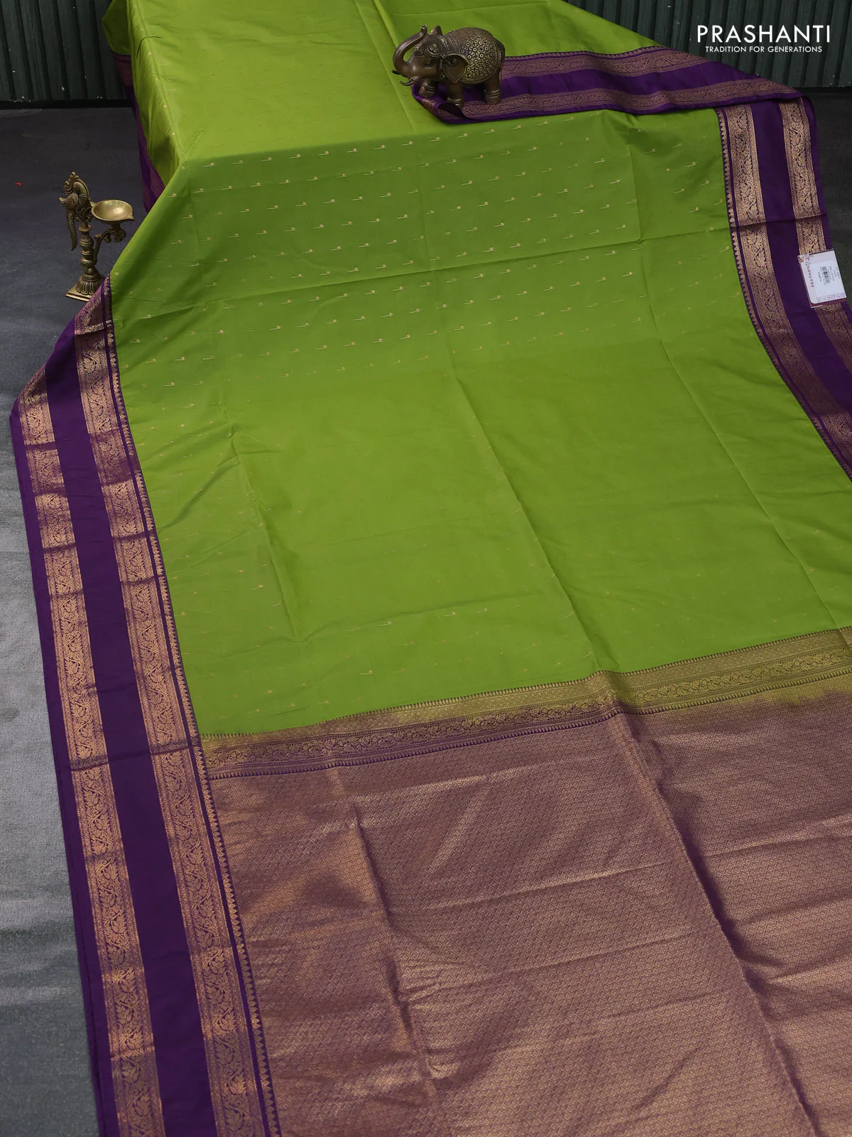 Semi soft silk saree light green and purple with allover zari woven buttas and rettapet zari woven border - Image 2
