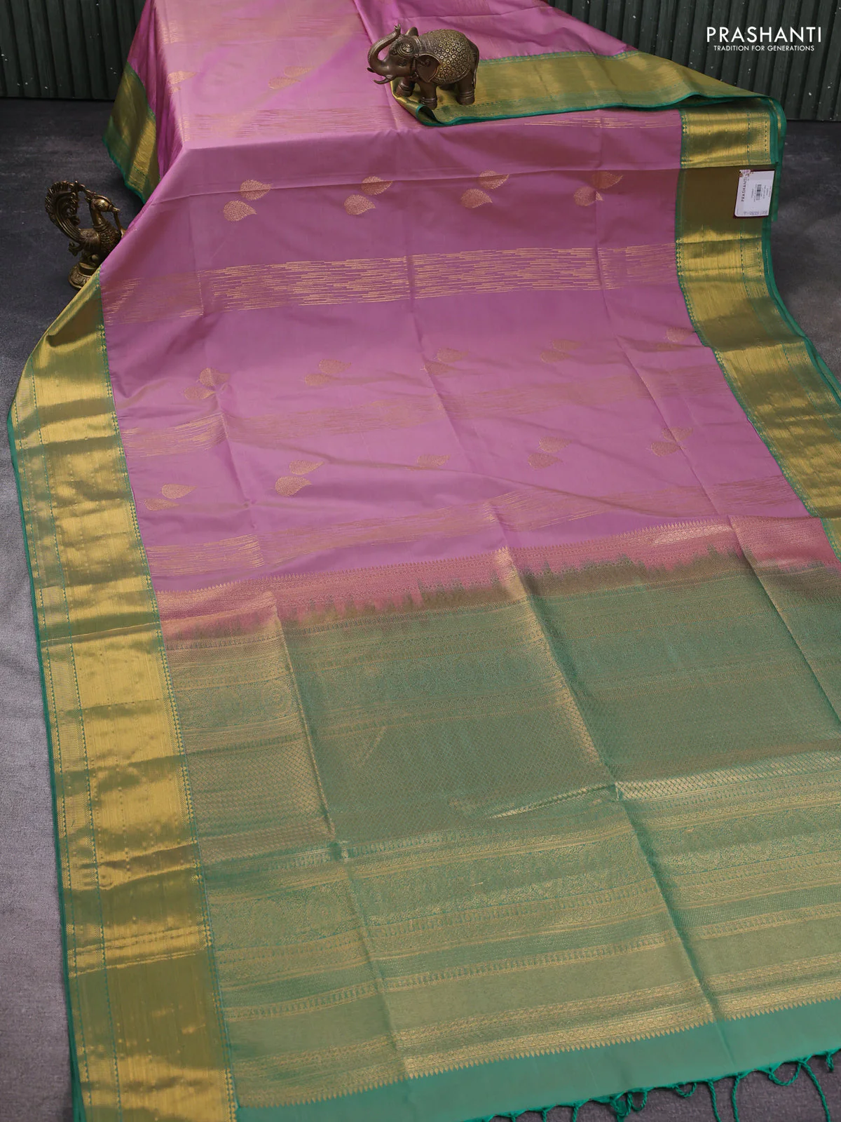 Semi soft silk saree mauve pink and green with allover zari weaves & buttas and zari woven border - Image 2