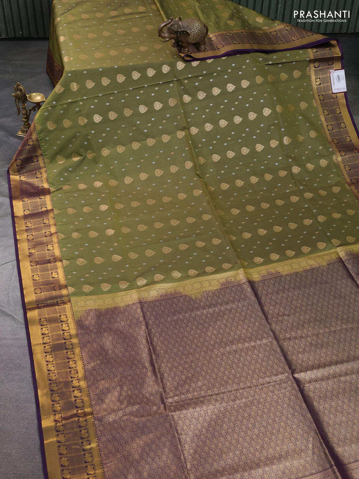 Semi soft silk saree mehendi green and deep purple with allover zari woven buttas and zari woven border - Image 2
