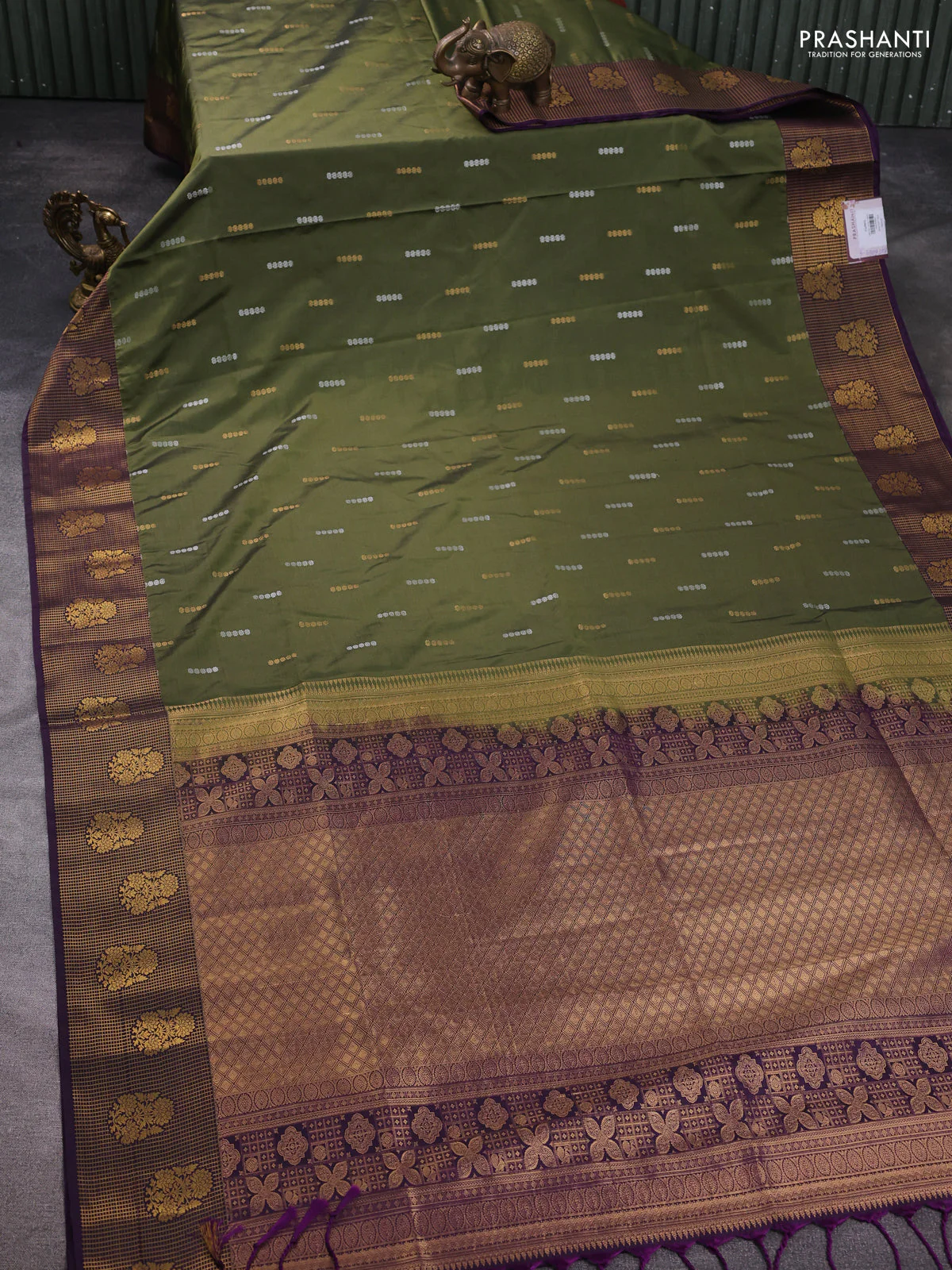 Semi soft silk saree mehendi green and purple with allover zari woven buttas and zari woven border - Image 2