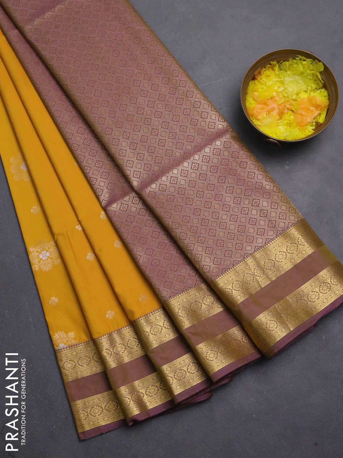 Semi soft silk saree mustard yellow and dual shade of purple with allover zari woven buttas and zari woven korvai border