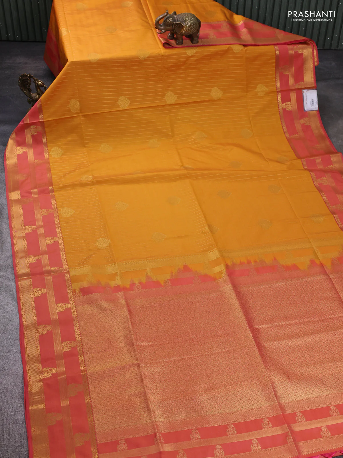 Semi soft silk saree mustard yellow and peach pink with allover zari weaves & buttas and zari woven border - Image 2